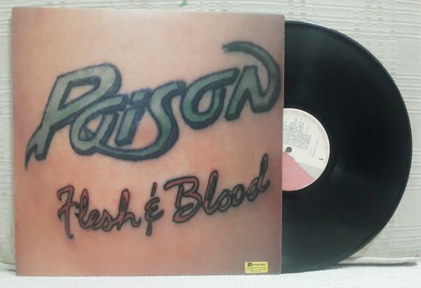 LP  POISON      FLESH  É BLOOD